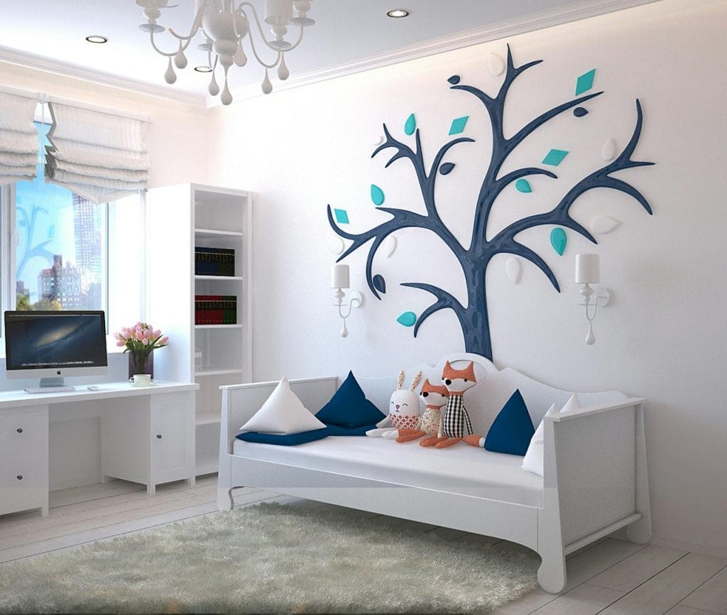 empty-bedroom-set-1648768 A stylish childrens room with a modern design featuring a tree wall art and plush toys.